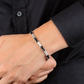 SKR36 Pulsera de plata y acero negro para hombre
